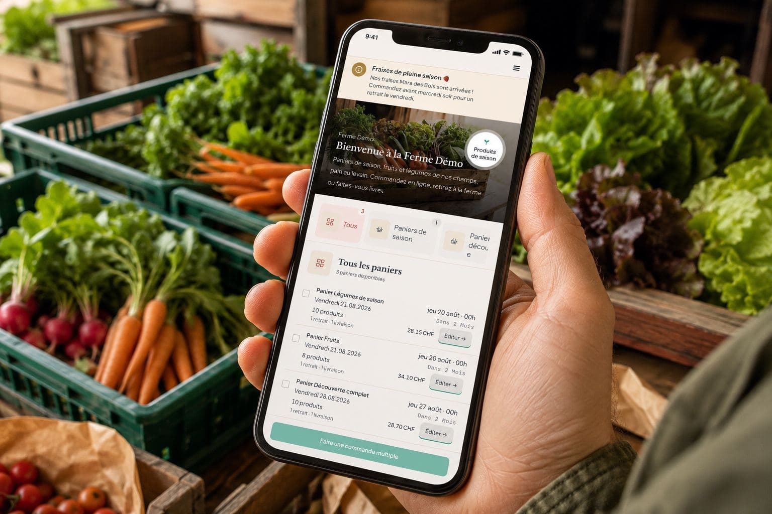 La boutique de la ferme sur un téléphone, devant les caisses de légumes fraîchement récoltés
